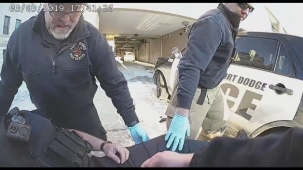 Medics treat an unresponsive police officer exposed to what officials believe may have been the deadly synthetic opioid fentanyl in Fort Dodge, Iowa, on March 3, 2019. (Fort Dodge Police Department)