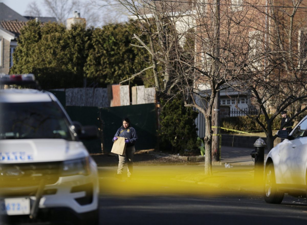 Police work near the scene where an alleged leader of the Gambino crime family was shot and killed in the Staten Island borough of New York, on March 14, 2019. (Seth Wenig/AP Photo)