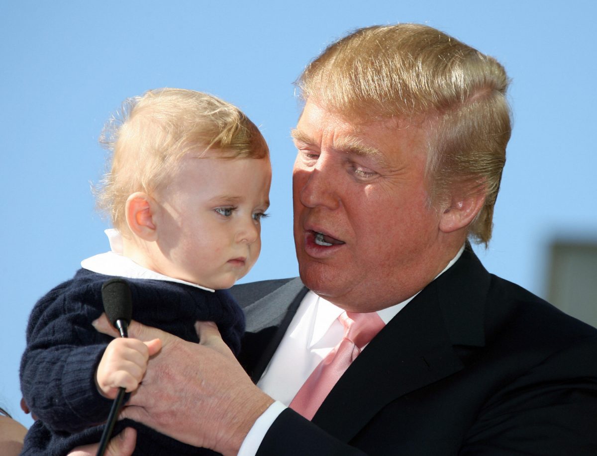 Donald Trump delivers a speech with his son Barron after he was honored with the 2,327th star on the Hollywood Walk of Fame on Hollywood Boulevard in Hollywood, CA on16 January 2007. (Gabriel Bouys/AFP/Getty Images)