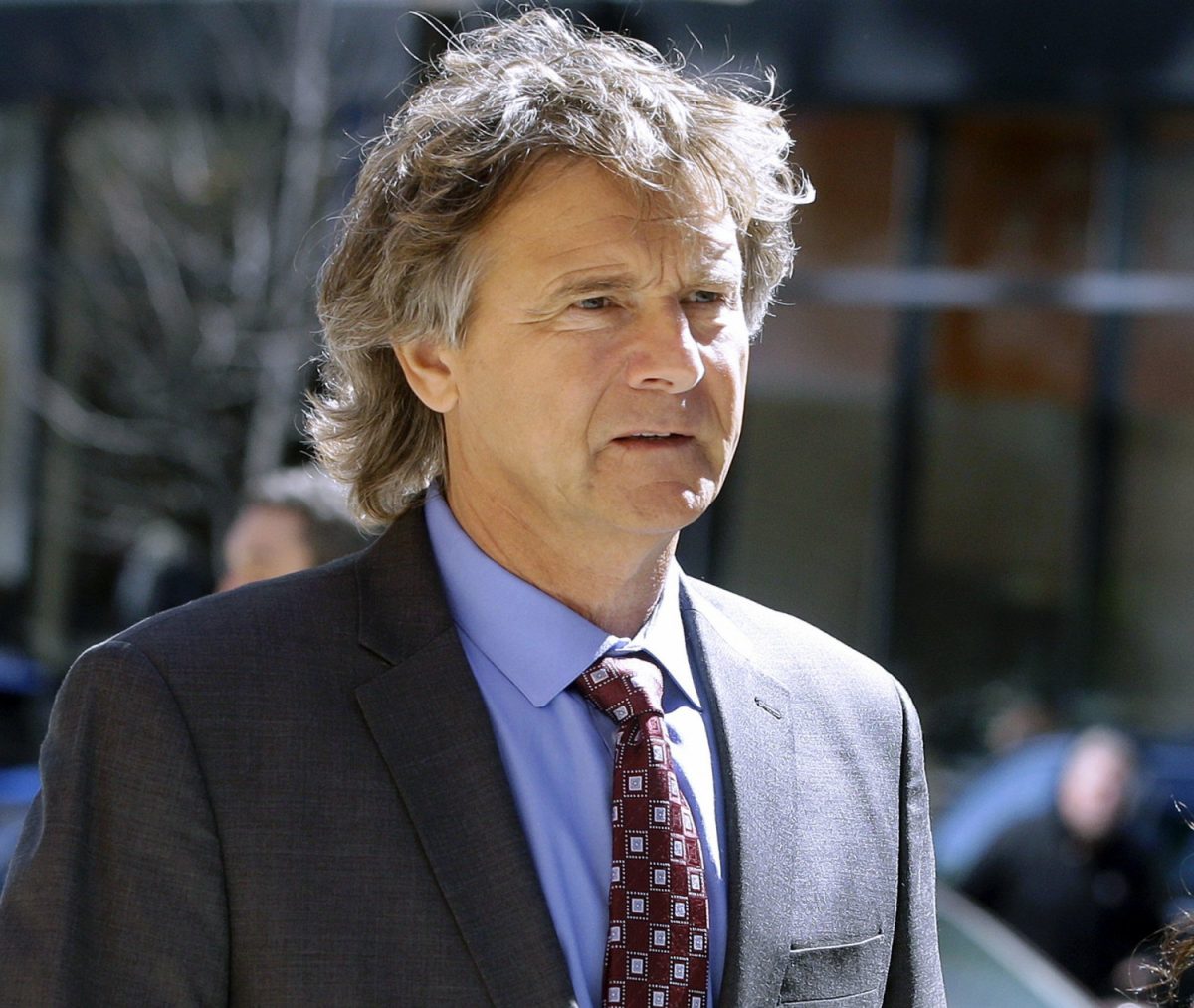 Jovan Vavic, former University of Southern California water polo coach, arrives at federal court in Boston on Monday, March 25, 2019, to face charges in a nationwide college admissions bribery scandal. (AP Photo/Steven Senne)