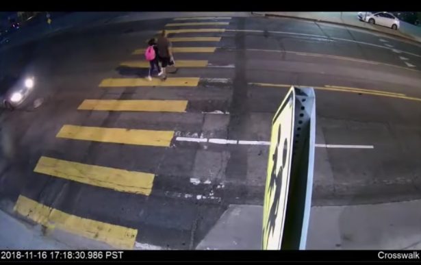 Michael Devore and his 11-year-old daughter on crosswalk in Glassell Park, Los Angeles, on Nov. 16, 2018. (LAPD)