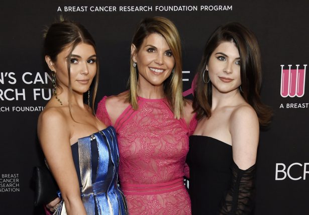 Actress Lori Loughlin poses with her daugthers