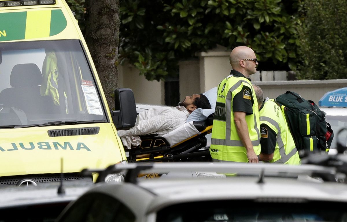 Ambulance staff take a man from outside a mosque in central Christchurch, New Zealand, on March 15, 2019. (Mark Baker/AP)