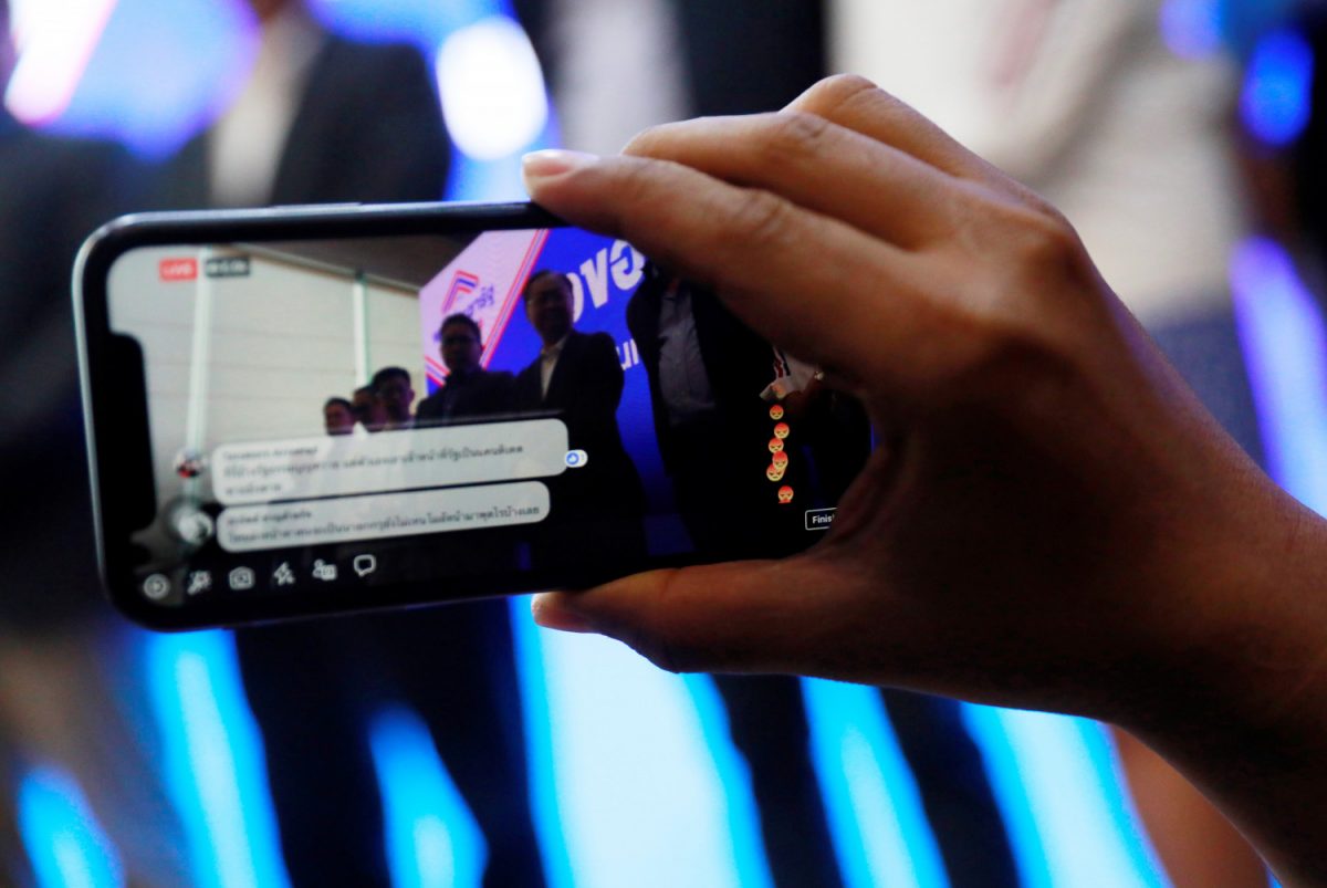 Angry reactions are seen on local media Facebook live as Palang Pracharat Party leader Uttama Savanayana attends a news conference during the general election in Bangkok, Thailand, on March 25, 2019. (Soe Zeya Tun via Reuters)