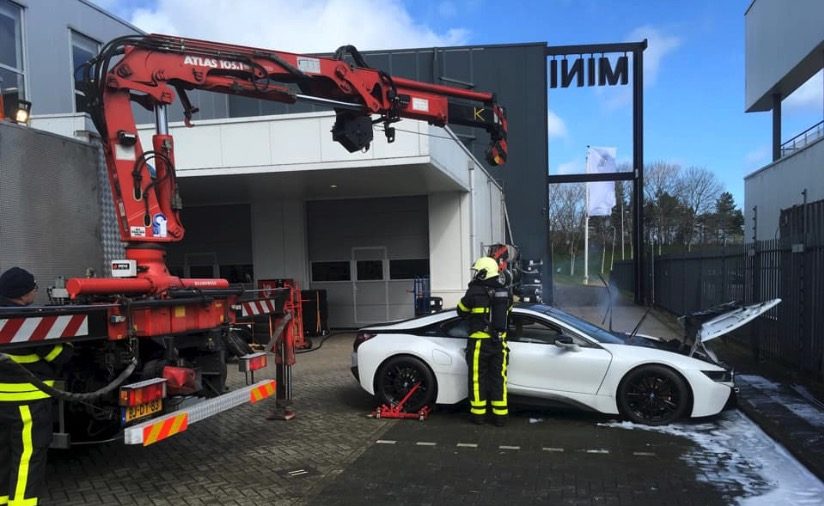 Firefighters Dunk Smoking BMW Hybrid Electric Vehicle in Huge Vat to Put It Out
