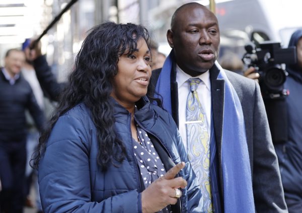 Tamara Lanier (L) and attorney Benjamin Crump arrive for a news conference near the Harvard Club in New York on March 20, 2019. (AP Photo/Frank Franklin II)