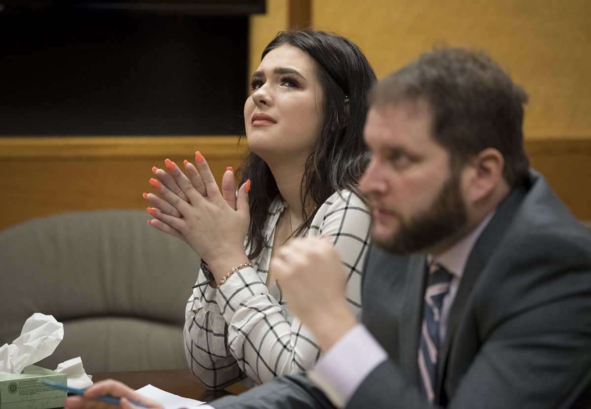Tay'Lor Smith, left, at the Clark County Courthouse in Vancouver, Wash., on March 27, 2019. (Amanda Cowan/The Columbian via AP)
