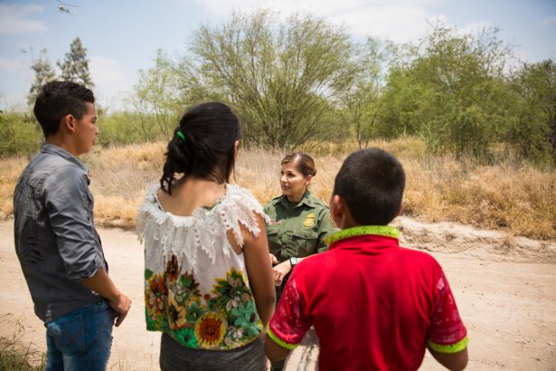 Marlene Castro, Supervisory Border Patrol Agent, speaks to a group of unaccompanied minors who crossed the Rio Grande River from Mexico into the United States in Hidalgo County, Texas, on May 26, 2017. (Benjamin Chasteen/The Epoch Times)