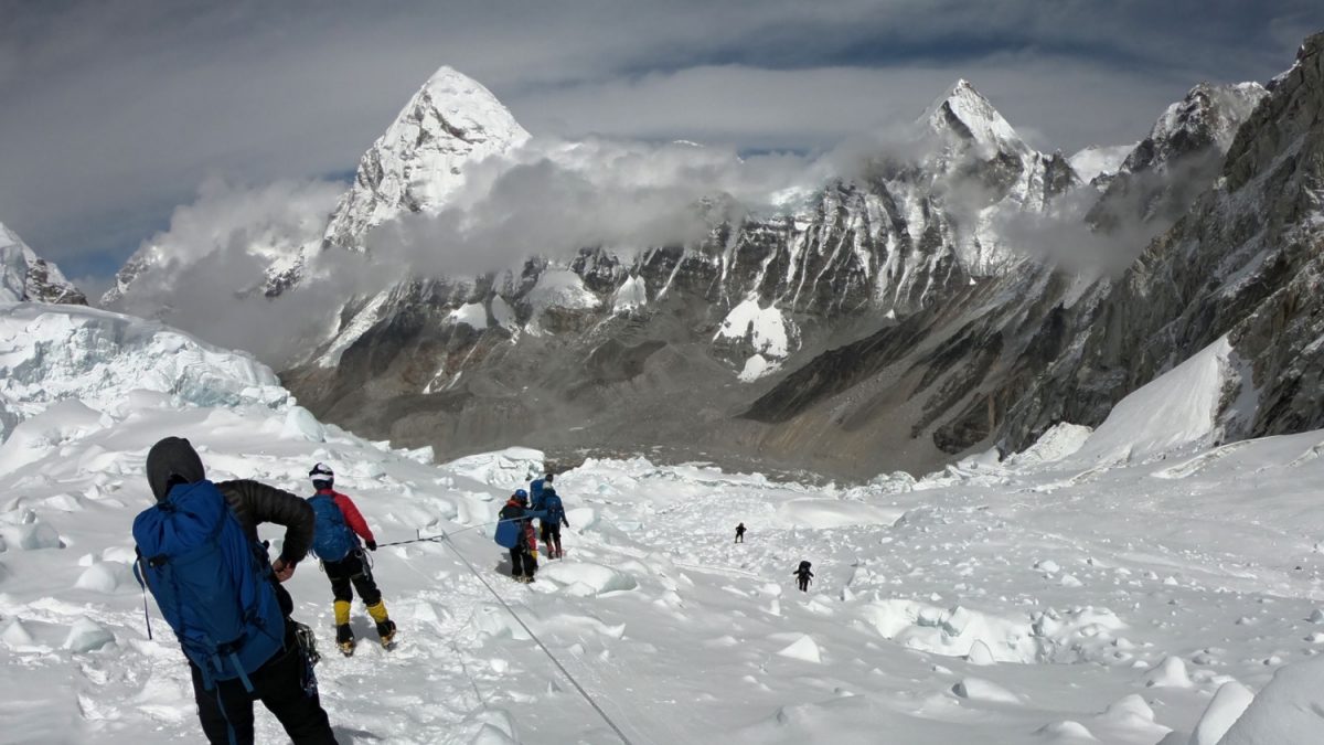 Mountaineers walk near camp one of Mount Everest, as they prepare to ascend on the south face from Nepal on April 29, 2018. (Phunjo Lama/AFP/Getty Images)