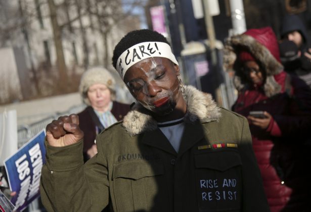Therese Okoumou poses for pictures and rallies with supporters before her sentencing in New York on March 19, 2019. (Seth Wenig/AP Photo)