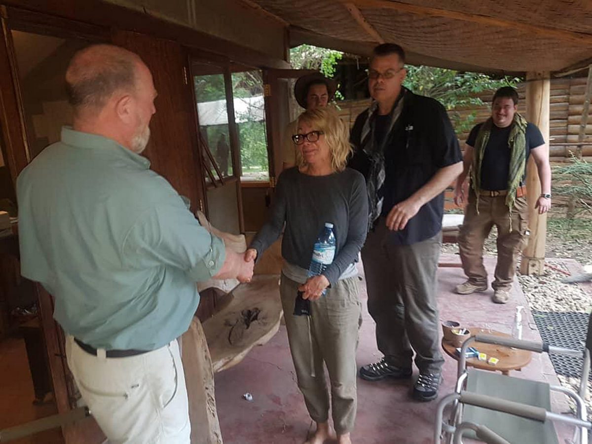 American tourist Kim Endicott, center, following her rescue after being kidnapped by unknown gunmen in Uganda's Queen Elizabeth National Park on April 8, 2019. (Wild Frontiers via AP)