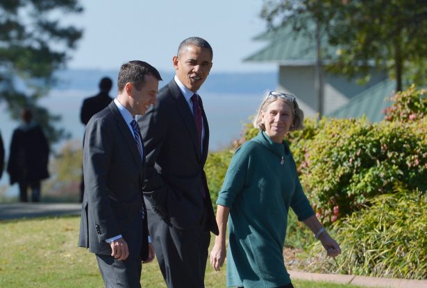 Then-President Barack Obama (C) walks with Senior White House Adviser David Plouffe (L) and Anita Dunn to debate preparation at the Kingsmill Resort in Williamsburg, Va. on Oct. 16, 2012. (Mandel Ngan/AFP/Getty Images)