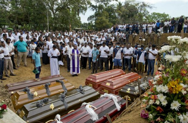 Mass burial for Easter Sunday bomb blast victims in Negombo, Sri Lanka, on April 24, 2019. (Gemunu Amarasinghe/Photo via AP)