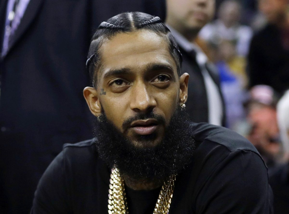 FILE—Rapper Nipsey Hussle at an NBA basketball game in Oakland, Calif., on March 29, 2018. (Marcio Jose Sanchez/AP Photo)