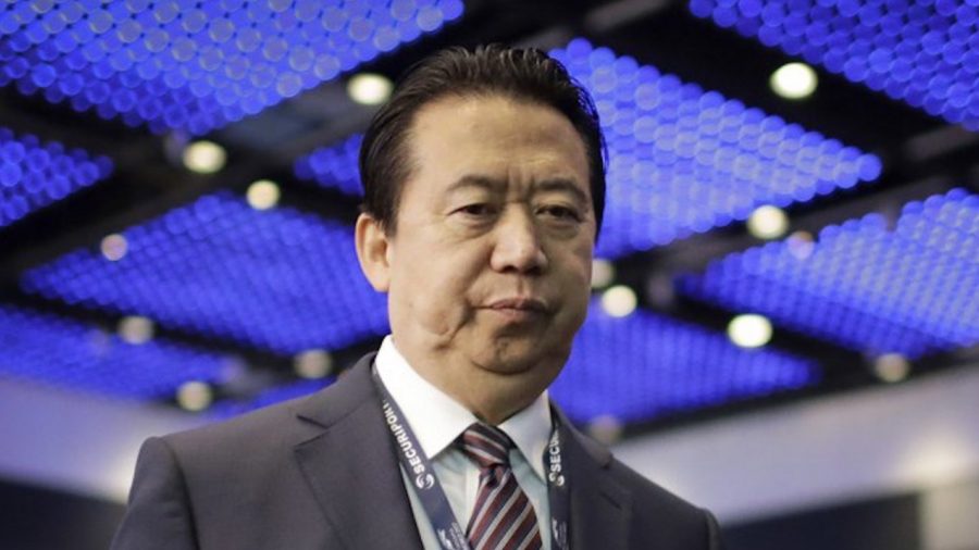 China Charges Former Interpol President With Bribery