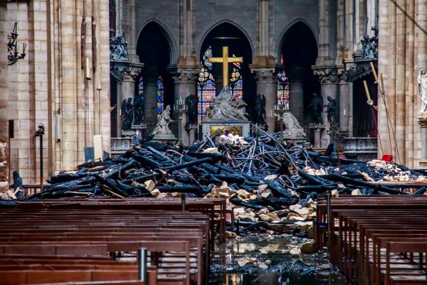 A cross at the altar in Notre-Dame de Paris survived the massive fire along with a number of other relics in Paris, France, April 16, 2019. (Christophe Petit Tesson/Pool via Reuters)