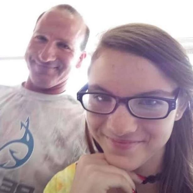 Deomeanna Spell, 15, right, with Corey Shane Disotell, 47, in a file photo. (Jerri Cradeur/Facebook)