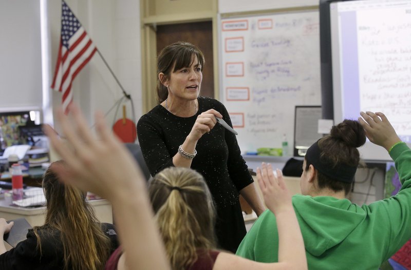 High school teacher Natalie O'Brien, center, calls on students during a civics class called "We the People," at North Smithfield High School in North Smithfield, R.I., on March 8, 2017. (Steven Senne/AP Photo)