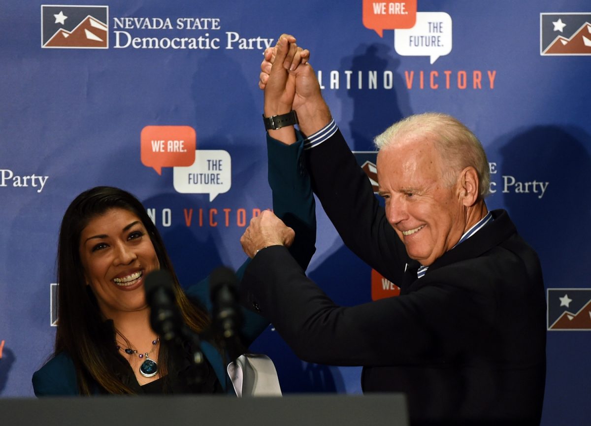 Democratic candidate for lieutenant governor and current Nevada Assemblywoman Lucy Flores (D-Las Vegas) (L) introduces Vice President Joe Biden at a get-out-the-vote rally at a union hall in Las Vegas, on Nov. 1, 2014. (Ethan Miller/Getty Images)