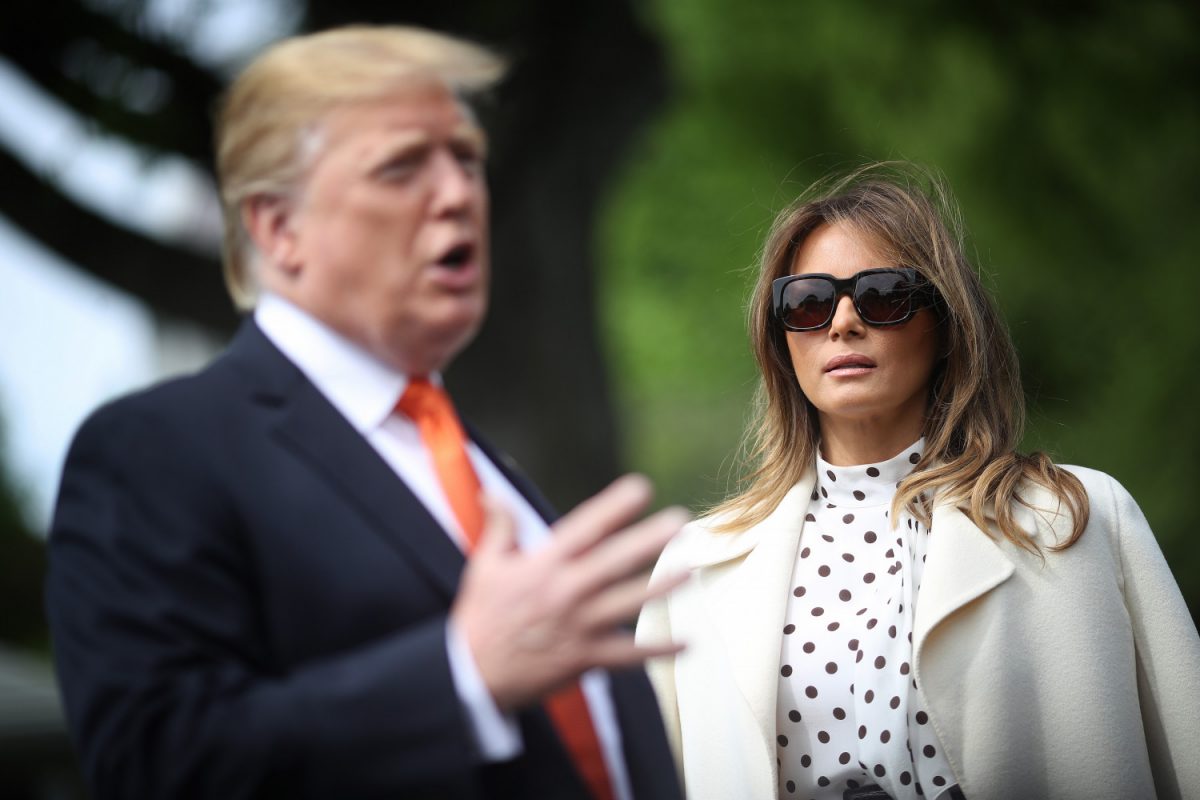 U.S. President Donald Trump answers questions with first lady Melania Trump while they depart the White House in Washington, on April 24, 2019. (Win McNamee/Getty Images)