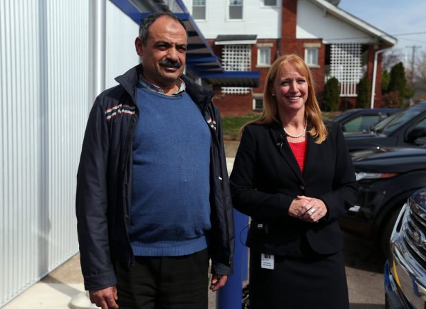 Mohamed Fathy Hussein Zayan and attorney Michelle Protzman speak during a news conference at the Barboursville Police Department in Barboursville, W.Va., on April 4, 2019. (Lori Wolfe/The Herald-Dispatch via AP)