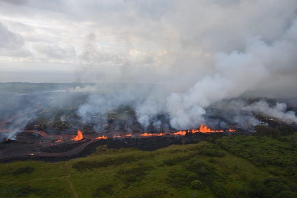 Lava flows downhill in this helicopter overflight image of Kilauea Volcano’s lower East Rift zone during ongoing eruptions in Hawaii on May 19, 2018. (USGS/Handout via REUTERS)