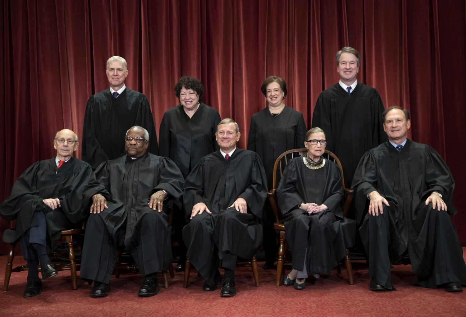 The justices of the Supreme Court gather for a formal group portrait to include the new Associate Justice, Brett Kavanaugh, top row, far right, at the Supreme Court Building in Washington, on Nov. 30, 2018. (J. Scott Applewhite/AP Photo)