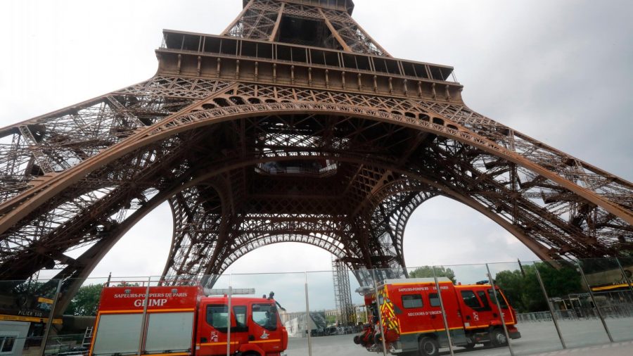 Eiffel Tower Evacuated as Man Seen Climbing the Landmark