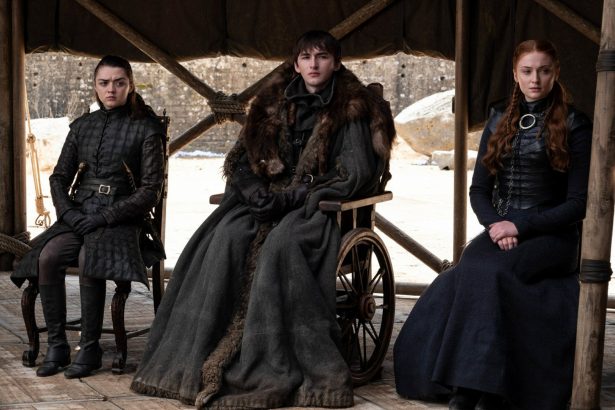 (L-R) Maisie Williams, Isaac Hempstead Wright, and Sophie Turner in a scene from the final episode of "Game of Thrones," that aired on May 19, 2019. (HBO via AP)