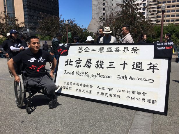 Fang Zheng lost both his legs during the Tiananmen protest in 1989. (Ilene Eng/NTD)