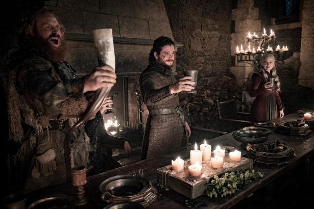 Kristofer Hivju, Kit Harington, and Emilia Clarke in a scene from "Game of Thrones." (Helen Sloan/HBO via AP)