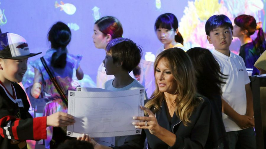 Melania Trump Colors Fish With Kids at Japan Digital Museum
