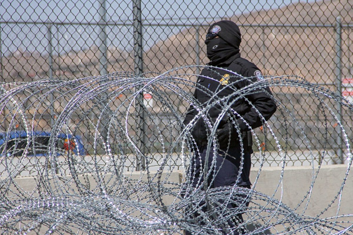 U.S. Customs and Border Protection (CBP) agents stand guard