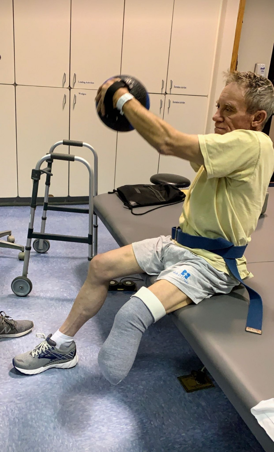 Kurtis Kaser undergoes physical thearpy to get stronger after losing his leg. (Amanda Kaser-Malousek via CNN)