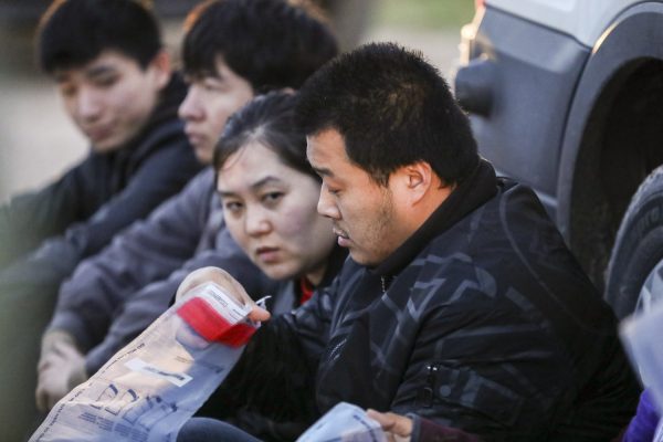 Border Patrol agents apprehend seven illegal immigrants from China, one from Mexico, and one from El Salvador after they tried to evade capture after crossing the Rio Grande from Mexico into the United States near McAllen, Texas, on April 18, 2019. (Charlotte Cuthbertson/The Epoch Times)