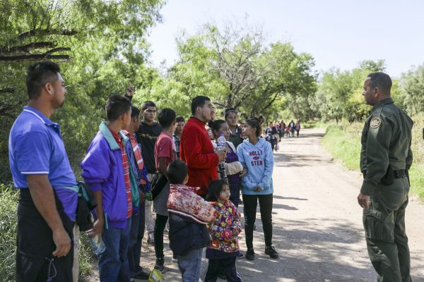 Border Patrol agent Carlos Ruiz apprehends 35 illegal aliens who have just crossed the Rio Grande from Mexico near McAllen, Texas, on April 18, 2019. (Charlotte Cuthbertson/The Epoch Times)