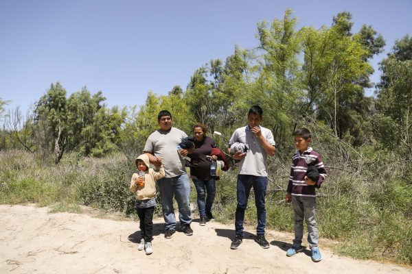 A group of illegal aliens who have just crossed the Rio Grande from Mexico near McAllen, Texas, on April 18, 2019. (Charlotte Cuthbertson/The Epoch Times)