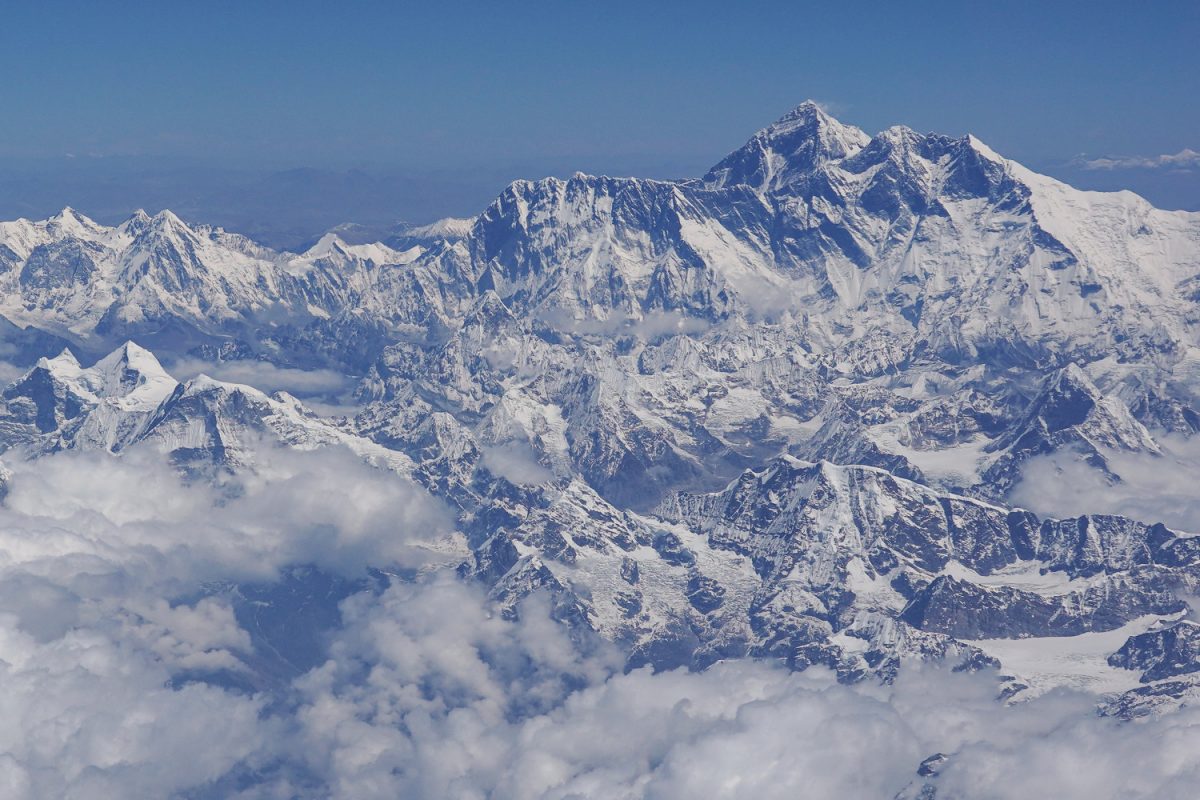 This photo taken on April 27, 2019, shows an aerial view of Mount Everest (center right) taken during a flight from Nepal to Bhutan. (Sarah Lai/AFP/Getty Images)