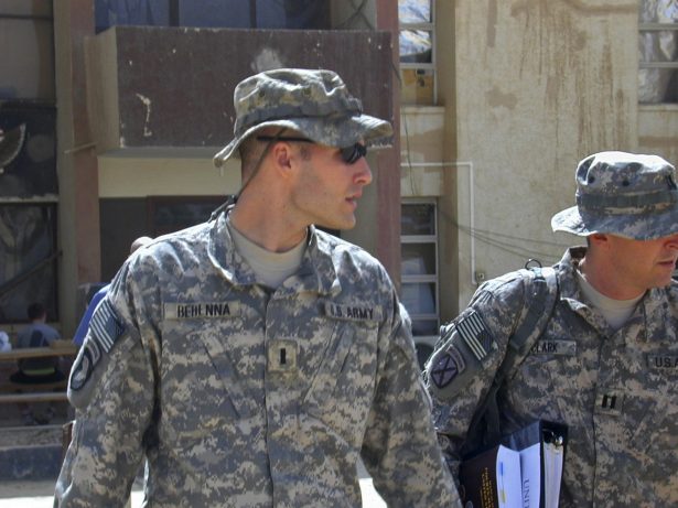 1st Lt. Michael C. Behenna (L), and his defense attorney Capt. Tom Clark walk in Camp Speicher, a large U.S. base near Tikrit, north of Baghdad, Iraq, on Sept. 21, 2008. (Vanessa Gera/AP Photo, File)