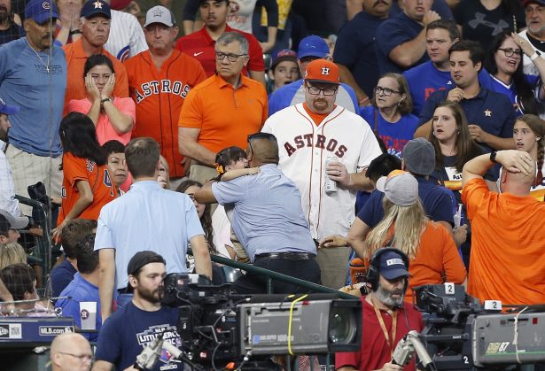A young child is rushed from the stands after being injured by a hard foul ball off the bat of Albert Almora Jr. #5 of the Chicago Cubs in the fourth inning at Minute Maid Park in Houston, Texas, on May 29, 2019. (Bob Levey/Getty Images)