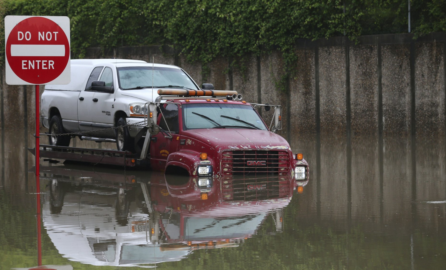 A truck stuck in the flooded intersection of Hardy and Crosstimbers streets after heavy rainfall overnight in Houston, on May 10, 2019. (Godofredo A. Vásquez/Houston Chronicle via AP)
