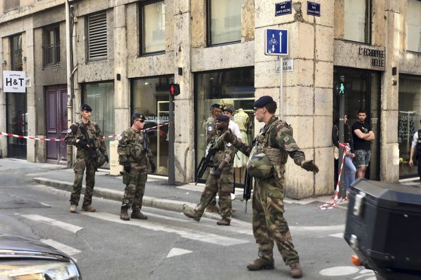 Soldiers of French anti terrorist plan "Vigipirate Mission", secure the area near the site of a suspected bomb attack in central Lyon, France, on May, 24, 2019. (Sebastien Erome/AP Photo)