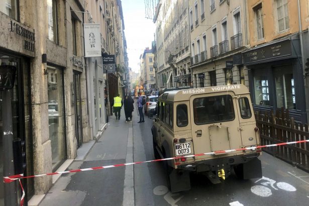 A vehicle of French anti terrorist plan "Vigipirate Mission", is seen near the site of a suspected bomb attack in central Lyon, France, on May, 24, 2019. (Sebastien Erome/AP Photo)