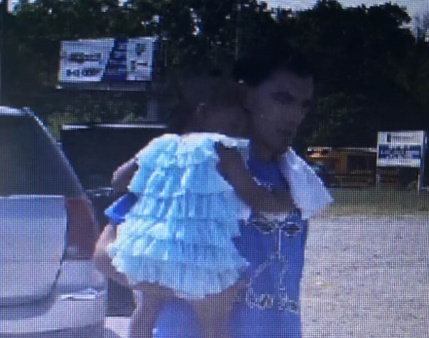 Matias Martinez standing outside of a vehicle in Tennessee on May 23, 2019, with 2-year-old Octavia Shaw. He was captured the next day. (Hamilton County Sheriff's Office)