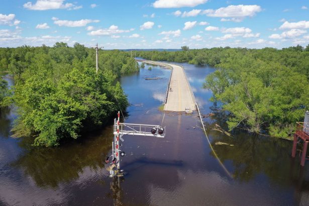 Floodwater from the Mississippi River cuts off the roadway from Missouri into Illinois at the states' border in Saint Mary, Miss., on May 30, 2019. (Scott Olson/Getty Images)