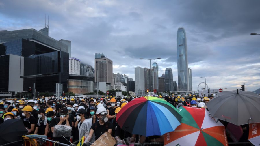 Hong Kong Protest Leaders Harassed Ahead of Anniversary March