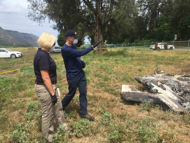 NTSB investigator Eliott Simpson briefing NTSB Board Member Jennifer Homendy at the scene of the Hawaii skydiving crash in Oahu, Hawaii, on June 23, 2019. (National Transportation Safety Board via AP)
