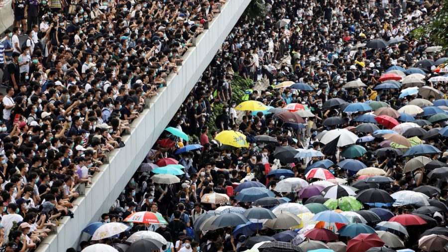 Thousands of Protesters Paralyze Hong Kong’s Financial Hub Over Extradition Bill