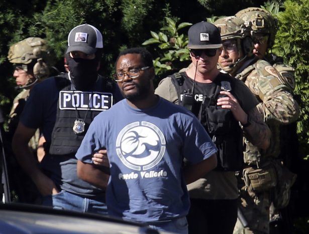Salt Lake City police take Ayoola A. Ajayi into custody in connection with missing University of Utah student MacKenzie Lueck in Salt Lake City on June 28, 2019. (Kristin Murphy/The Deseret News via AP)
