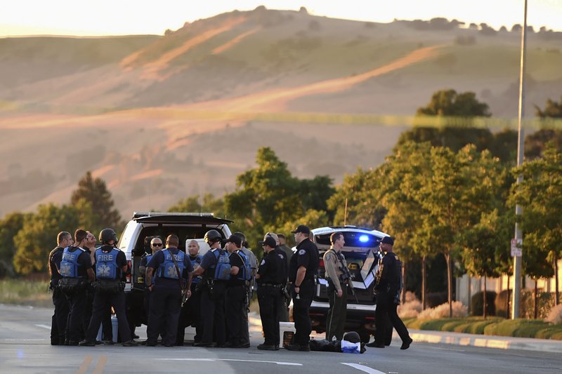 Police investigate at the scene of a shooting at the Morgan Hill Ford Store in Morgan Hill, Calif., on June 25, 2019. (Nic Coury/AP Photo)